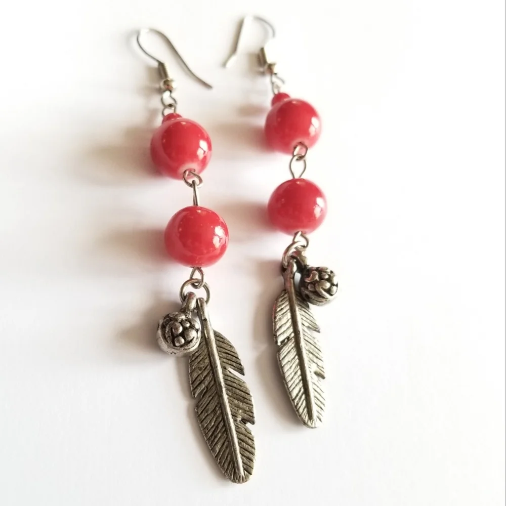Feather earrings with red beads and flower ball beads silver tone boho